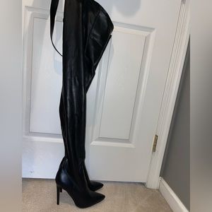 Thigh high chap stiletto heels